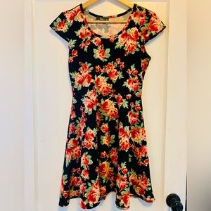 Floral mini dress…super fun to wear! Ignore the size…it says XL but fits a S/M